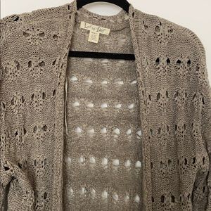 Sweater mid length w/ distressed hole design
